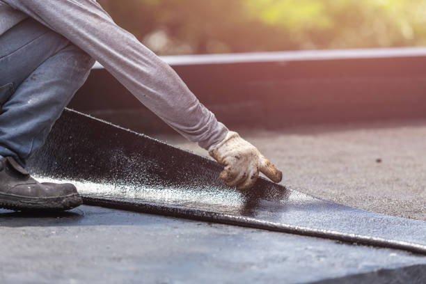 Professional Basement Waterproofing technician working in Foscoe, NC